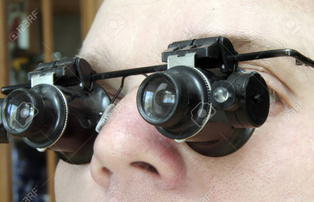 special glasses Microscopes on a man's face